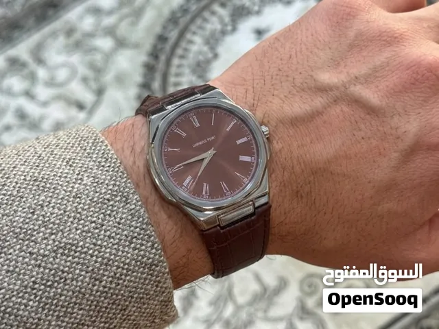 ساعه رجاليه بسير جلد طبيعي بني شاشه ضد الخدش والماء،مكينه كوارتز تعمل على نظام البطاريه