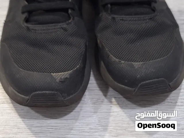 black adidas shoes