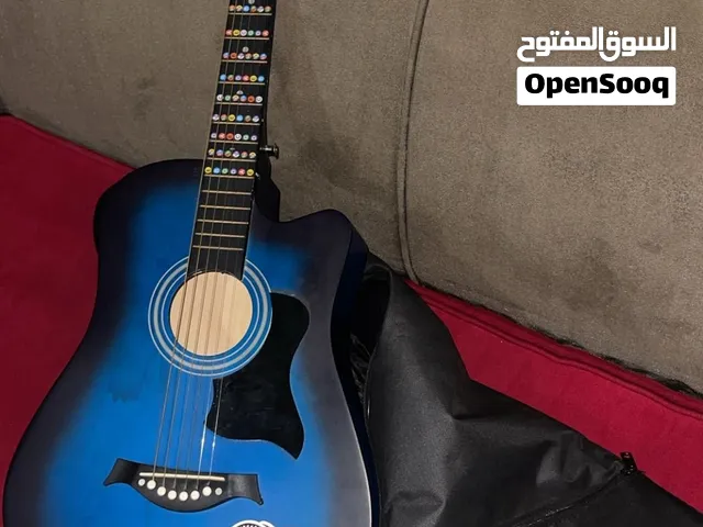جيتار اكوستيك مع جميع ملحقاته