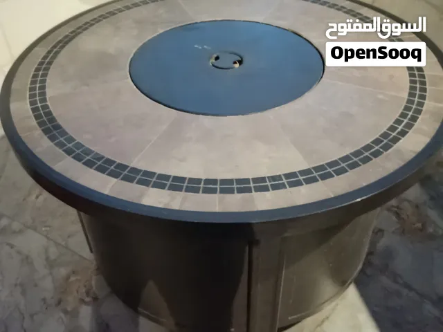 طاولة مدفأة غاز خارجية فاخرة (Gas Fire Pit Table) مع جرة غاز وساعة