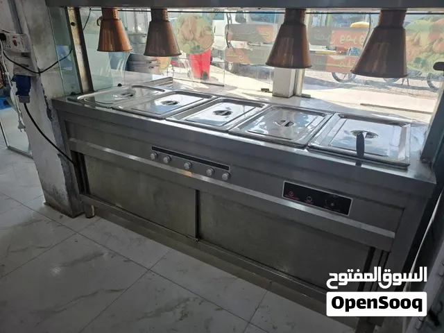حمايه اكل نظيفه جدا وميز فلافل قلي وشوايه همبركر