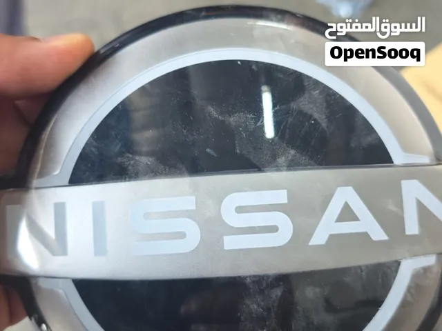 شعار أمامي نيسان التيما 23-25