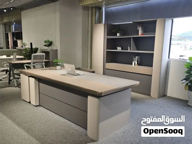 Modern L-shaped executive office desk.