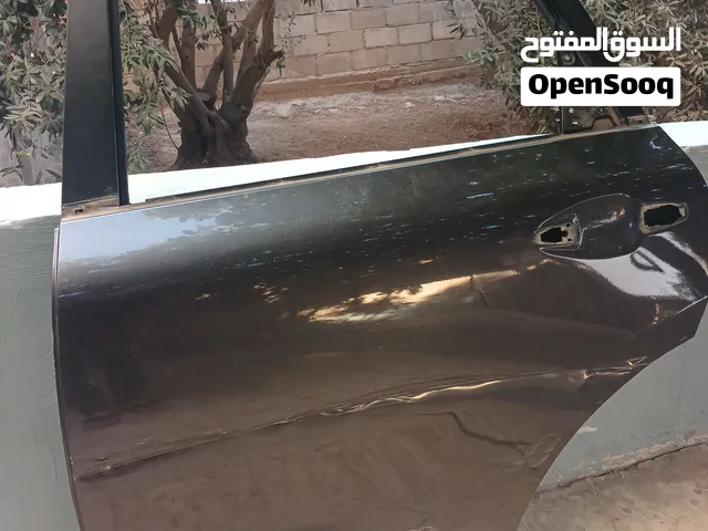 باب كيا نيرو شمال خلفي لون رمادي ميتالك
