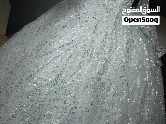 فساتين عروس ابيض
