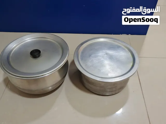 bowls and strainer and grill chicken