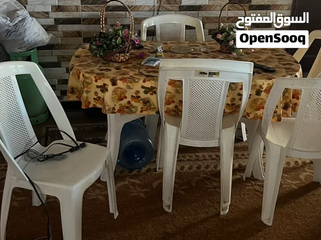 طاولة سفرة بلاستيك + 6 كراسي جديده