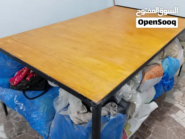 ترابيزة قص قماش مستويين