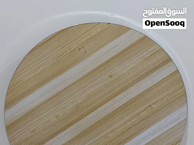 Circular floor table