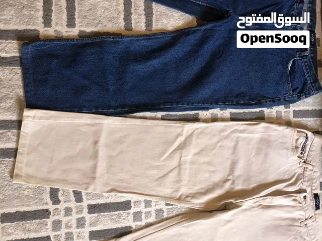 ملابس بنطلون جنز 2 رقم 40 وقمصان 4