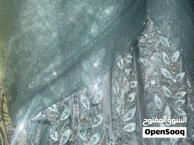 Dress تركوازي روعههه و ثيبانننن الحقو صوره صوره جوفوها مهمين (ثوب+فستان) اي ثوب و فستان مع بعض 350