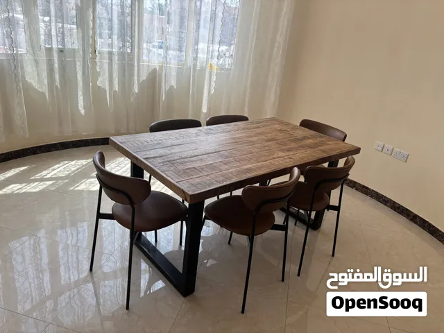 Dinner table with chairs