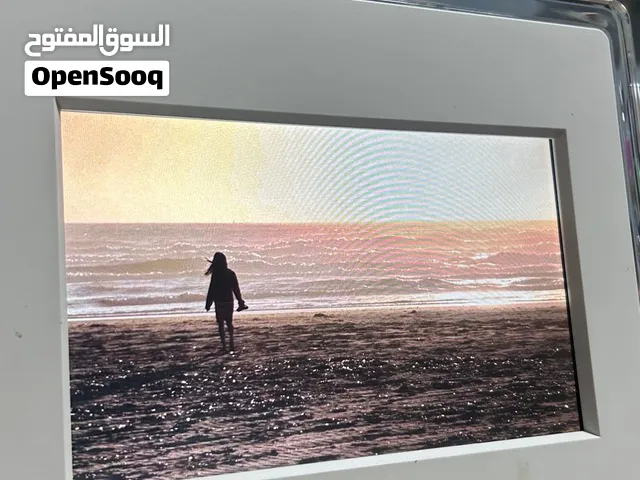 جهاز momento لعرض الصور عن طريق فلاشة