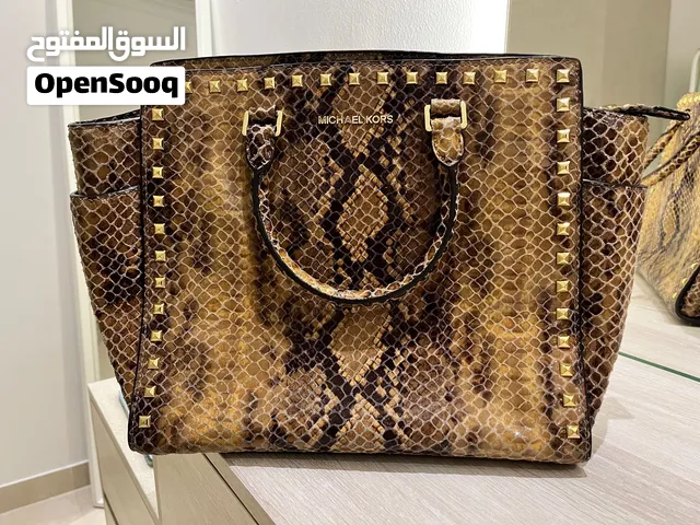 brown Michael Kors for sale  in Central Governorate