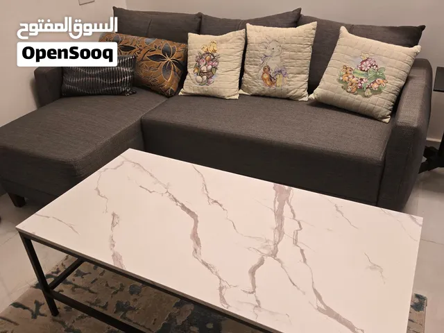 sofa corner bed and cofe table