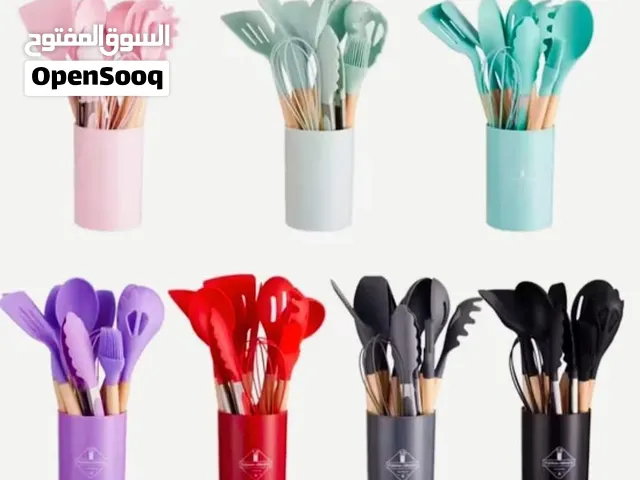 ملاعق سيلكون طقوم مع العلبة كبير هل تبحث عن الجمع بين الأناقة والكفاءة في مطبخك؟ نقدم لك طقم أدوات ا