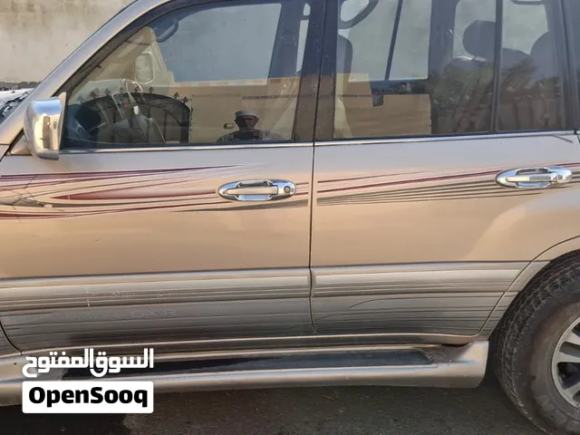 لاندكروزر ذهبي 2004 ثالث مستخدم