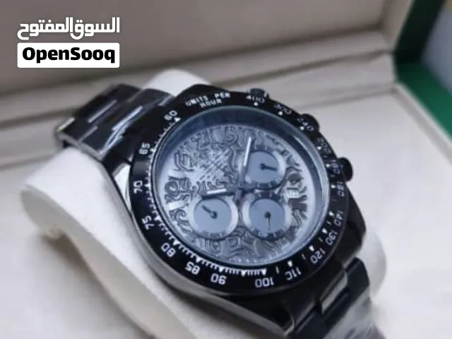 ساعة رولكس فخمة تقليد درجة أولى للبيع الساعة باللون الأسود الملكي، مع مينا داخلي باللون الفضي المميز