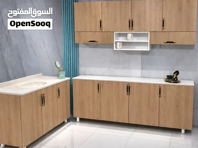 كاونترات خشب مترين ارضي وملحق مع سنك متر وعشرين مرمر 320