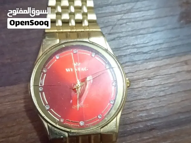ساعه مطليه ذهب للبيع