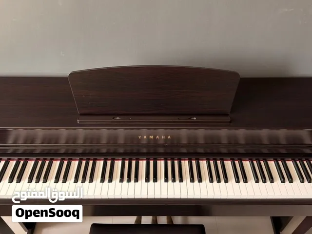 Yamaha CLP635 Digital Piano with Bench - Dark Rose Wood Finish