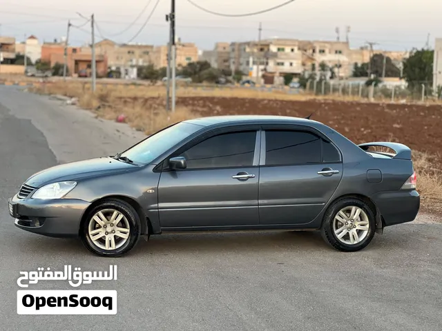 ميتسوبيشي لانسر GLX 2011 وارد الكويت رقم مميز