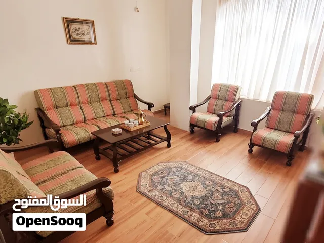 طقم كنب للبيع خشب سويدي اربع قطع وطاوله السعر160 الف
