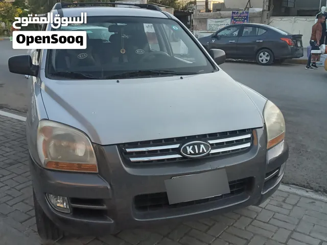 كيا سبورتاج 2007 وارد امريكي حجم المكينه 2000 كندي اللون سلفر مكينه اربع سلندر