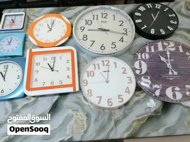 9 ساهات حايط متنوعه مقاسات كله