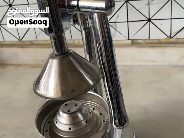 عصارة الحمضيات يدوي