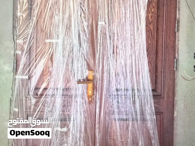 باب خارجي زان عرض متر ونص