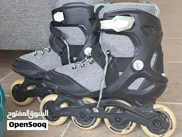 Oxelo Skates with helmet.  free knee cap