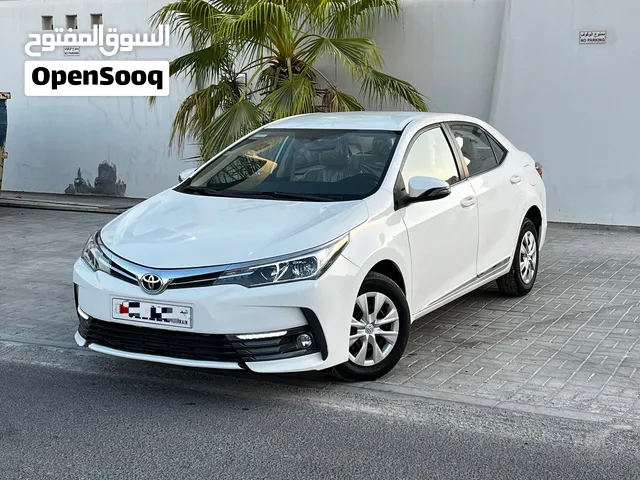 Toyota Corolla • Model: 2018 • Mileage: 73000 KM • Color: White • Transmission: Automatic • Engin