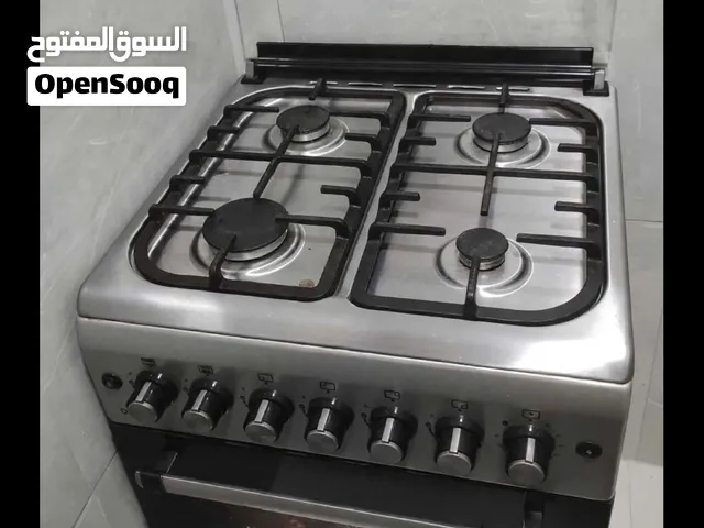 غسالة وغاز مع الانبوبة (قنينة الغاز )   Washing machine and gas cylinder (gas cylinder)