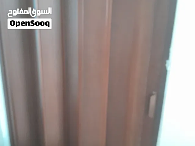 باب اكوردين لون بني