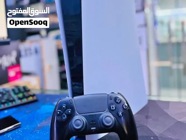 playstation 5 with controller and cables