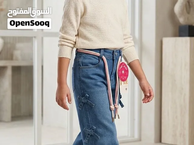 بنطلون جينز وايد ليج أطفالي تريند الفيونكات