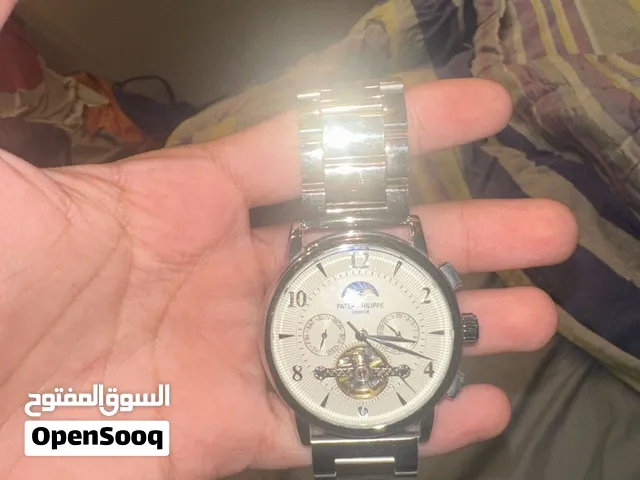 Patek Philippe Geneve Silver Watch It is not authentic but it is a mirror copy of it