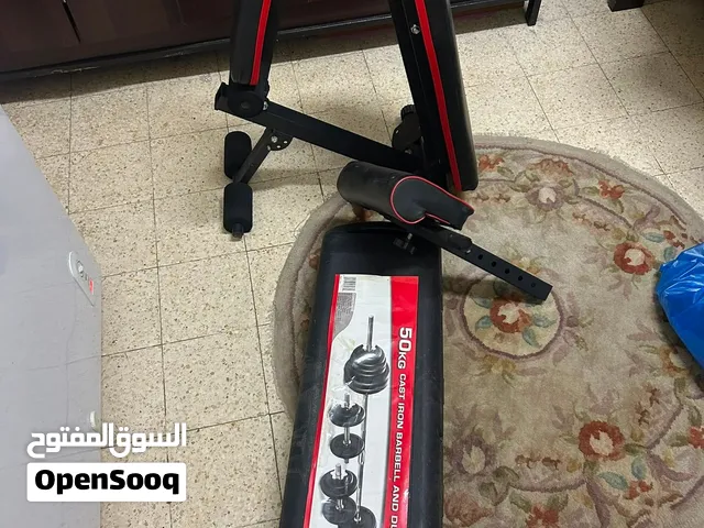 دمبلز و بار 50 كيلو + كرسي جيم متحرك الظهر