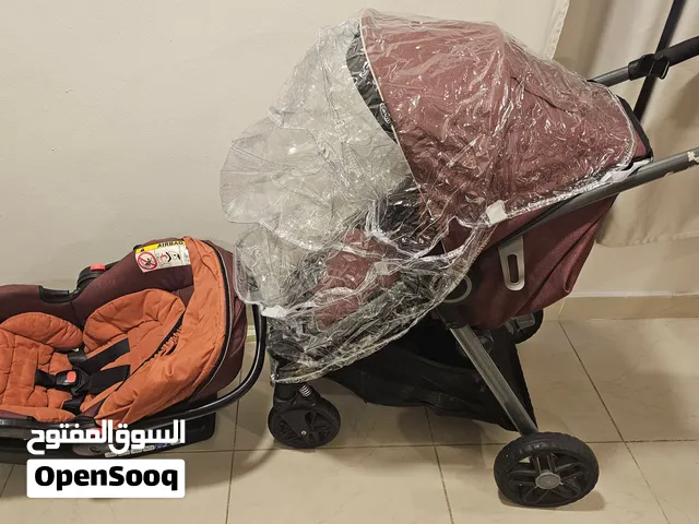 عرباية سترولر اطفال وكرسي سيارة ماركة جراكو الامريكيه