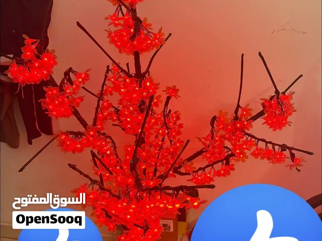 شجره ورد ب اضاءه احمر