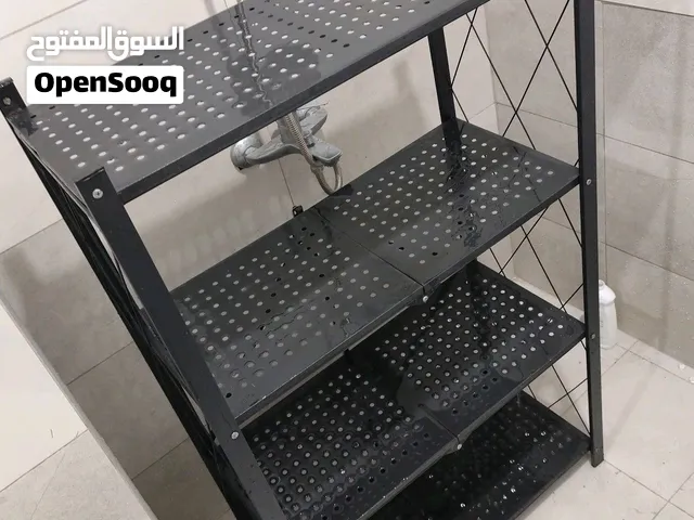 منظم ارفف معدني شبه جديد التفاصيل بالوصف