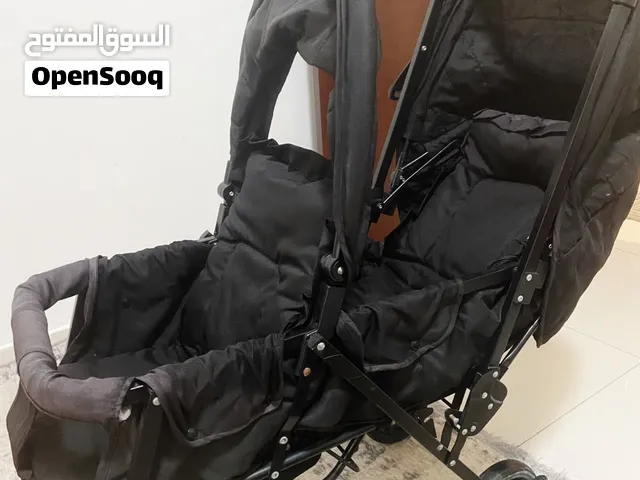 عرباية أطفال وكرسي سيارة بحالة جيدة
