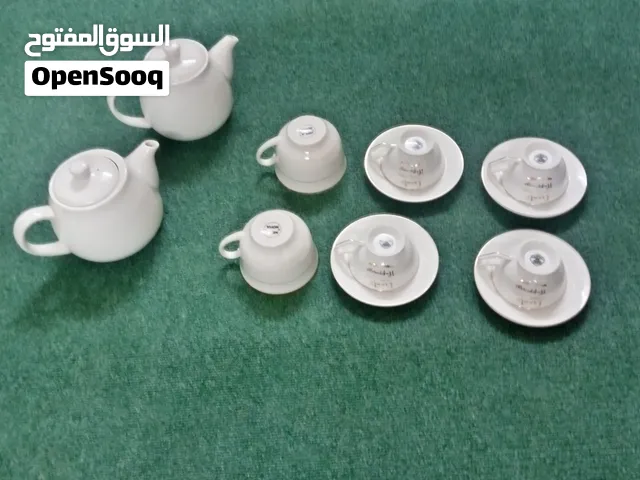 طقم قهوة  أكواب صحون 2 ابريق  مصنوع من الخزف