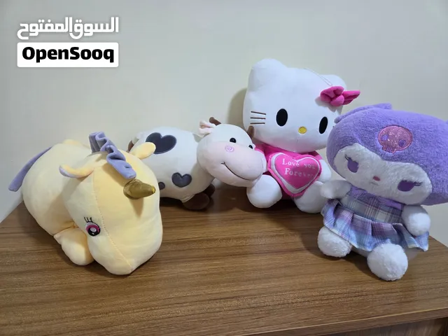 Stuffed soft dolls and bears