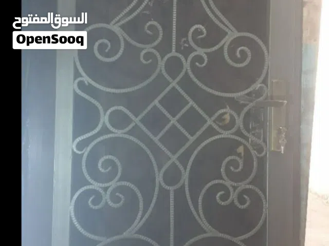 باب حمايه مزغرف كامل بالحربات  الثقيله شغل كمبيوتر مع زرفيل كامل اصلي ومساكات اصليه عريضه