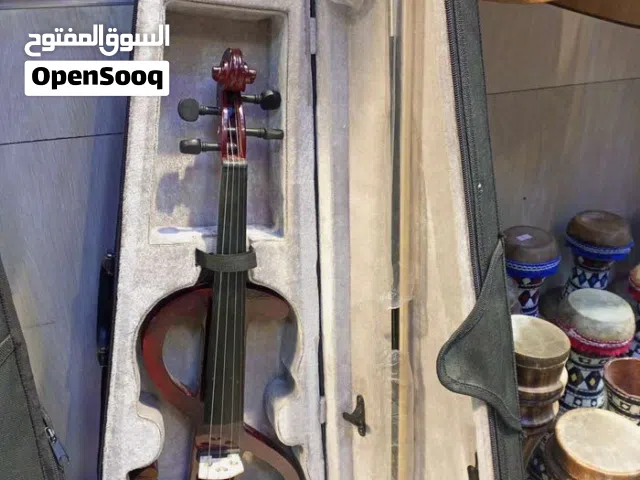 كمان كهربائي قياس 4/4 مع شنتة كامل العدة  متوفر لونين ابيض و خمري متوفر توصيل ب 3 دنانير