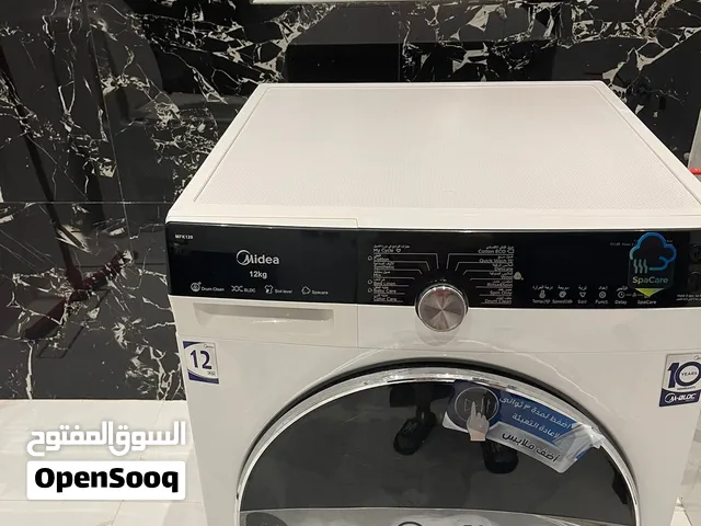 للبيع غسالة ملابس ماركة ميديا شبه الجديداستعمال جدا نظيف 12 كيلو