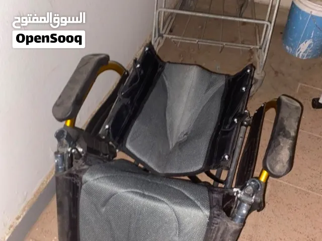 كرسي متحرك اسود ورمادي