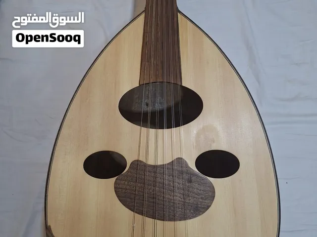 عود عصام الوزيري الزان الروماني المصدف و الوجه من خشب السويدي و المفاتيح ابانوس و المرايا من السيسو